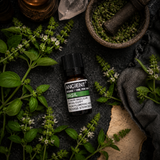 10 ml Basil Essential Oil — overhead lifestyle flat lay