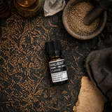 10 ml Cumin Seed Essential Oil — overhead lifestyle flat lay
